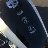 Close-up of a motorcycle with 101st Airborne Division Metal Auto Decal on the fuel tank.