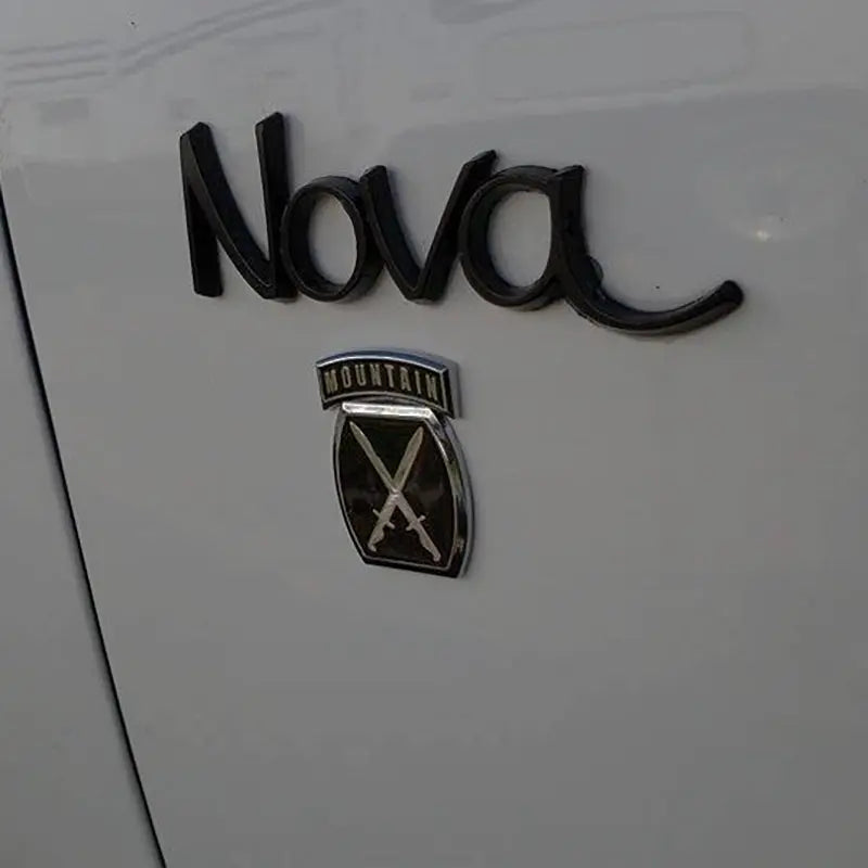 Black and Chrome 10th Mountain Division Metal Decal on White Car
