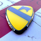 Full Color 1st Cavalry Division Metal Auto Emblem on a red and white background