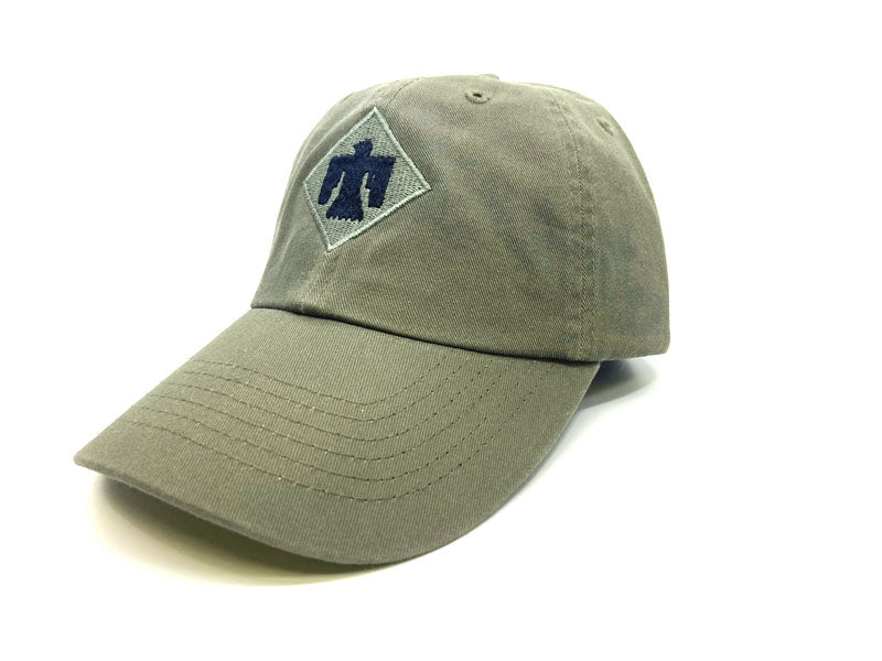Green cap with a logo on a white background