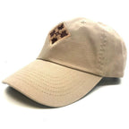 Beige baseball cap with a patch on a white background