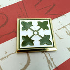 4th Infantry Division Metal Auto Emblem on a red and white background
