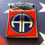 82nd Airborne Division Metal Decal insignia on a flag background