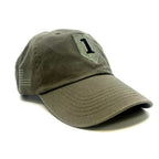 1st Infantry Division OD Cap with a curved brim, featuring a black embroidered number '1' patch on the front and a matching American flag patch on the side, set against a plain white background.