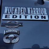 Emblems on a vehicle indicating 'Wounded Warrior Edition' and 'Airborne' Parachutist Badge Jump Wings Metal Decal 