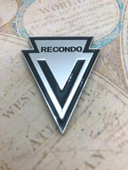 Recondo Badge Metal Car Decal on a map background
