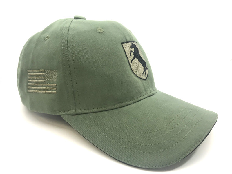 11th Armored Cavalry Regiment Subdued Green cap with embroidered logo on a white background