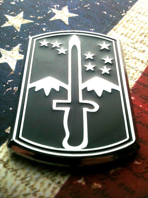 172nd Infantry Brigade Metal Decal in Black and Chrome on a Red, White and Blue Background