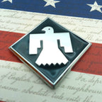 45th Infantry Division Thunderbird Metal emblem on a flag background