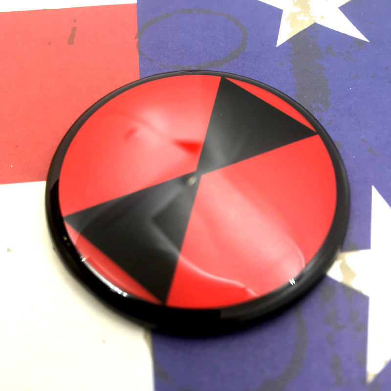 7th Infantry Division Light Fighters Metal Auto Emblem on a red, white and blue flag background