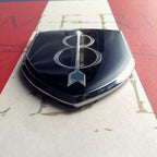 8th Infantry Division Metal Auto Emblem Zoom on Botton Tip on a red and white background