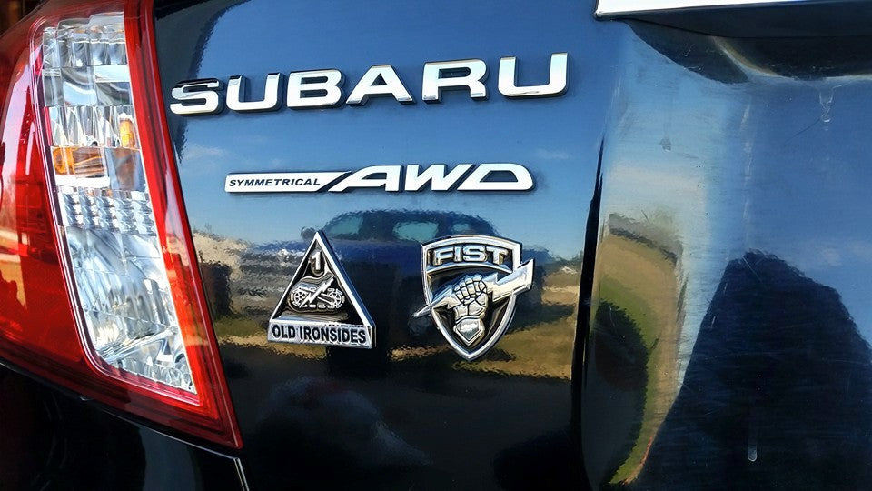 1st Armored Division Old Ironsides Metal Auto Emblem On a Subaru Rrar Fender