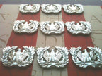 Set of 9 Warrant Officer Eagle Rising Metal Car Emblems on a red, white and blue background
