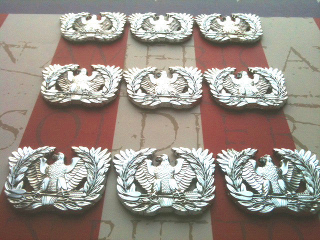 Set of 9 Warrant Officer Eagle Rising Metal Car Emblems on a red, white and blue background