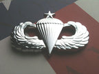 Senior Parachutist Badge Metal Decal Replica Badge on a Red, White and Blue Background