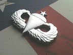 Chrome Senior Parachutist Badge Metal Decal Angled to the Right on a Red, White, and Blue Background