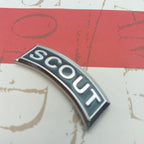 Scout Tab emblem on a red and grey background