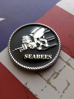 Seabees emblem on a flag background