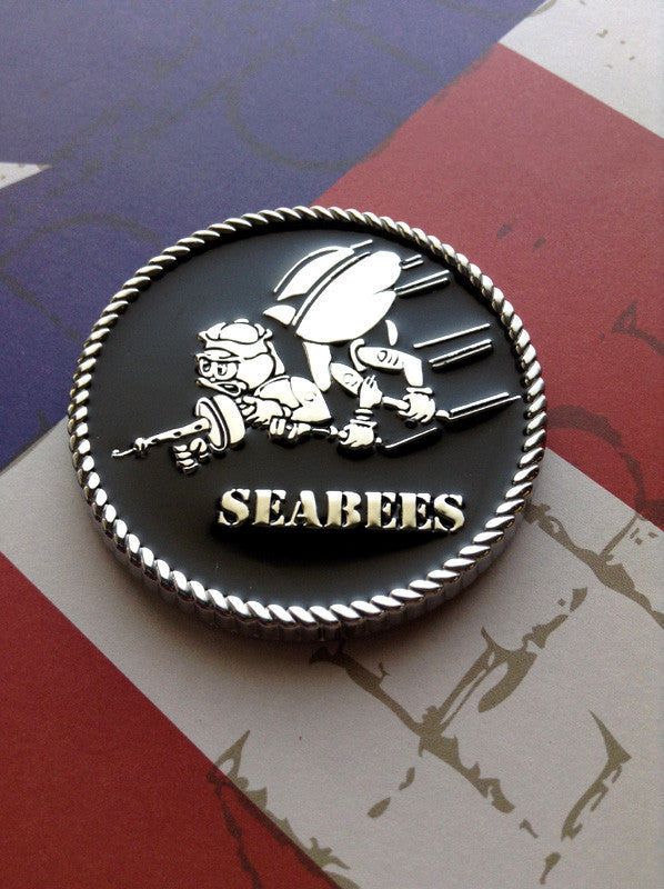 Seabees emblem on a flag background